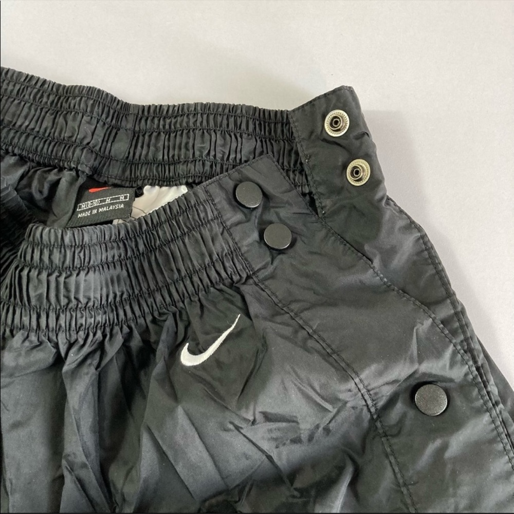 Nike vintage womens black nylon rip away pants medium snap legs wind track
